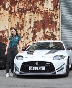 Young Enthusiast stands beside Jaguar at Young Drivers Experience Day