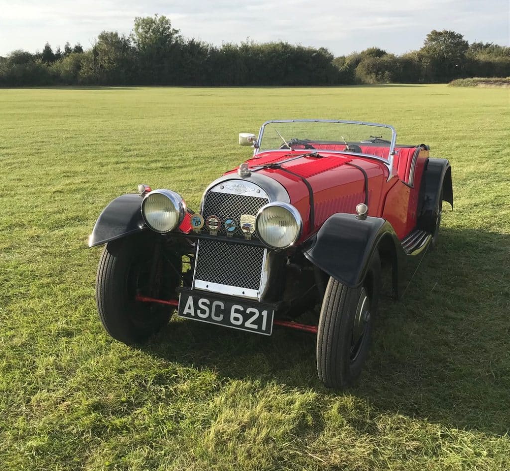 Red Morgan 4/4 which debuted at the 1936 Paris Motor Show