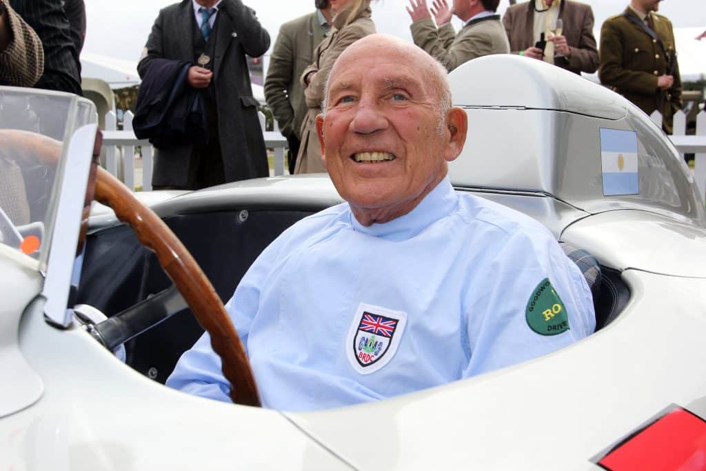 Sir Stirling Moss pictured in historic car