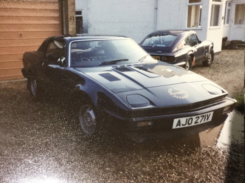 Old photograph of a black Triumph TR7